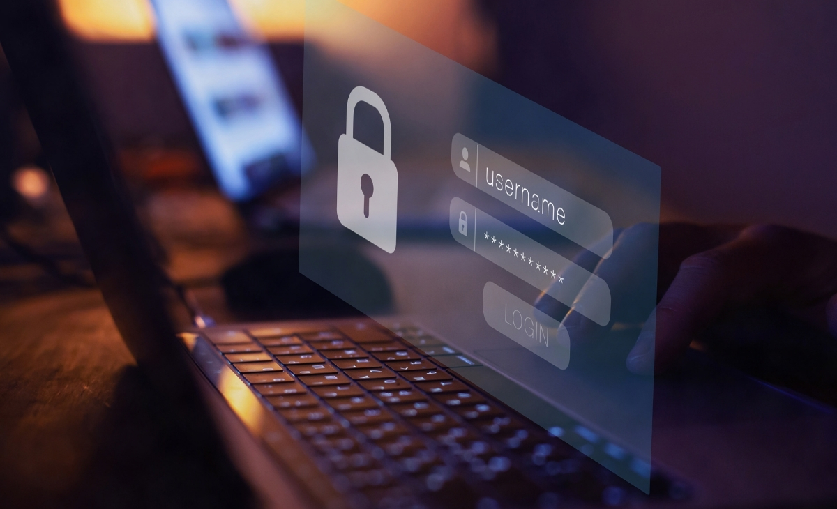 Laptop screen displaying login fields with username and password, representing cybersecurity and data protection.