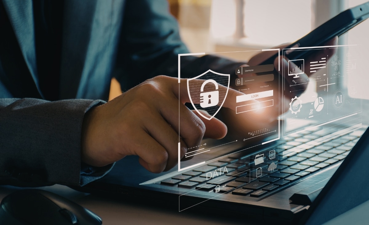 A conceptual digital shield icon over a glowing network grid, representing J700 Group’s Zero Trust security solutions for businesses in Lancashire and Manchester.
