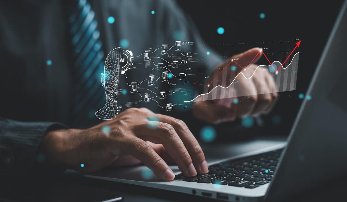 Business professional interacting with data and cybersecurity icons on a laptop.